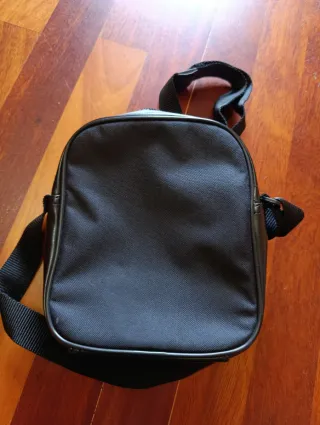 Bandolera Puma floral negra