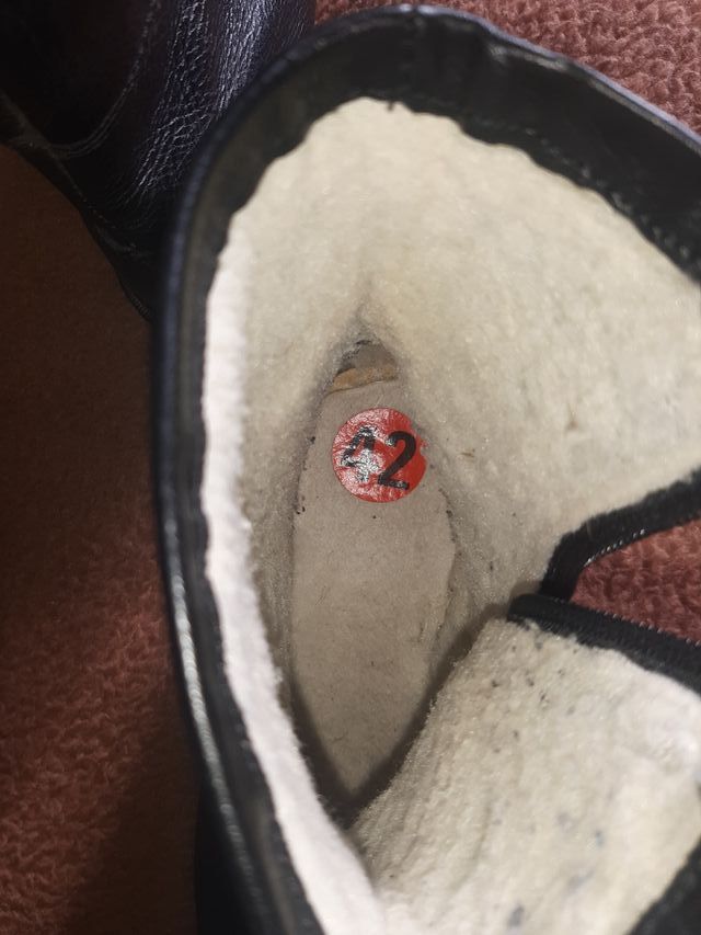 Botas de cuero negras con cremallera