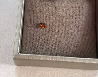 Pendiente oro niña elefante circonita