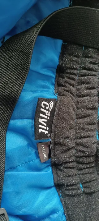 Pantalón y chaqueta de esquí infantil azul