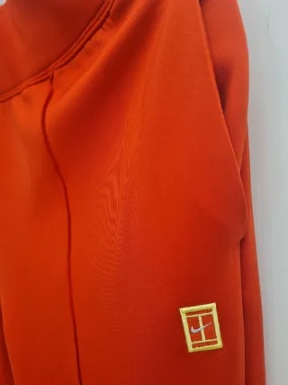 Pantalón deportivo Nike naranja(NO NEGOCIABLE) .