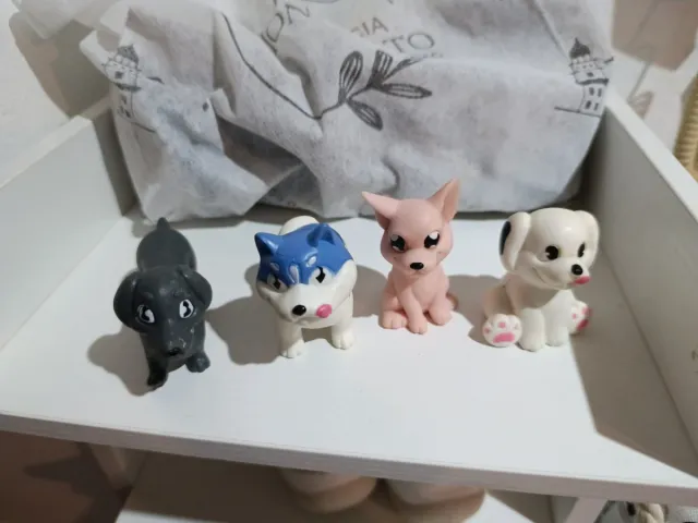 Lote 4 figuras perritos