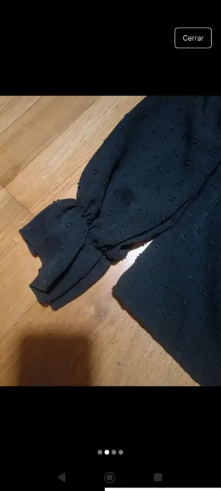 Blusa negra cuello alto