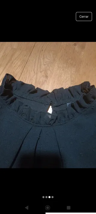 Blusa negra cuello alto