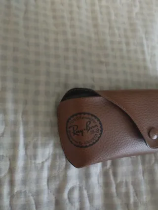 Gafas de sol hexagonales doradas y negras