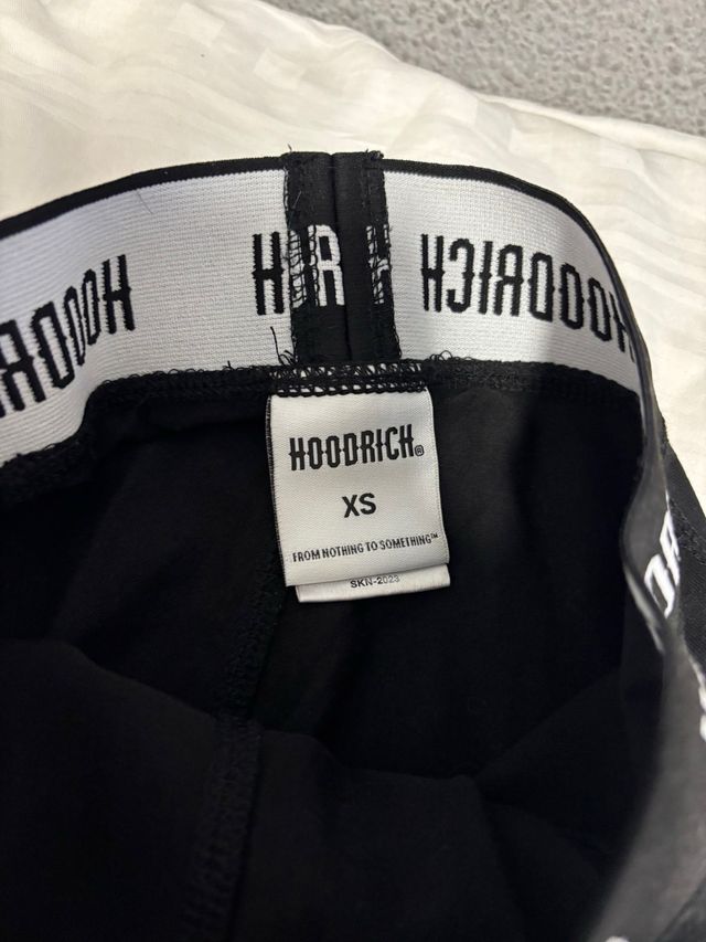 Mallas negras Hoodrich con bolsillo para movil