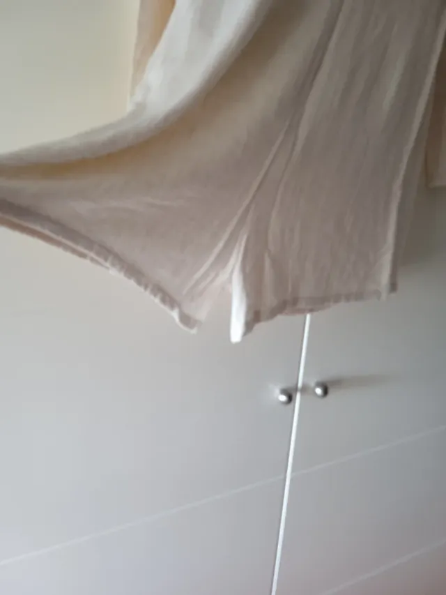 Blazer pantalón beige.