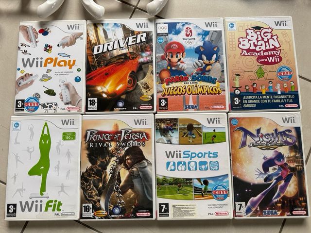 Consola Wii + Wii Fit + 8 Juegos