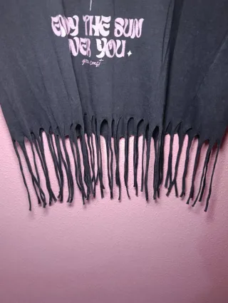 Camiseta sin mangas con flecos