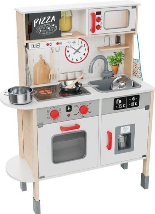 Triciclo rosa con peluche