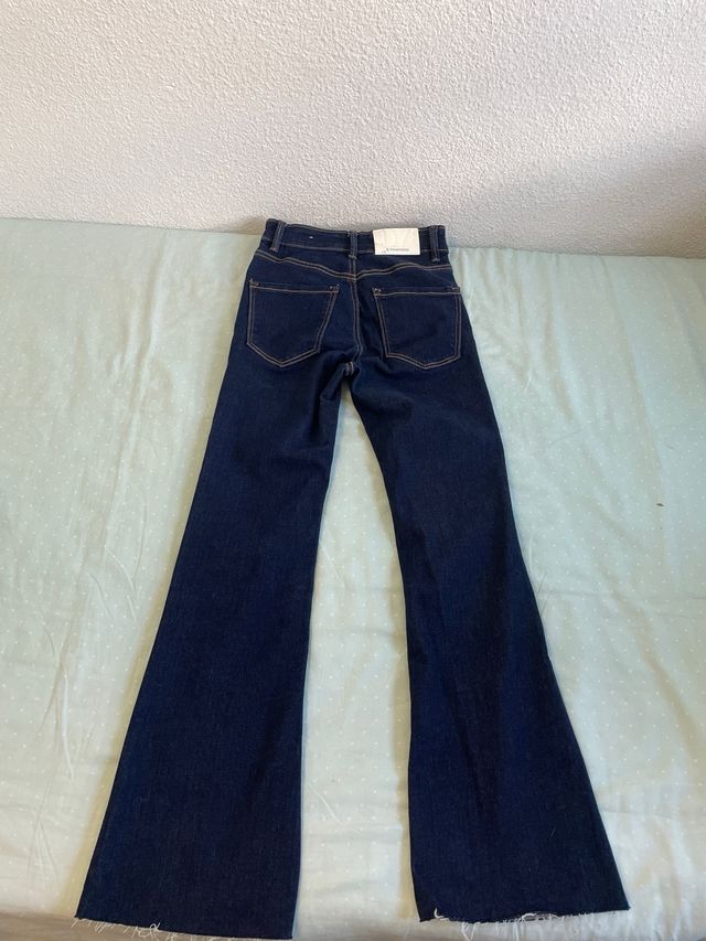 Pantalones vaqueros campana mujer talla 32, ud:7€