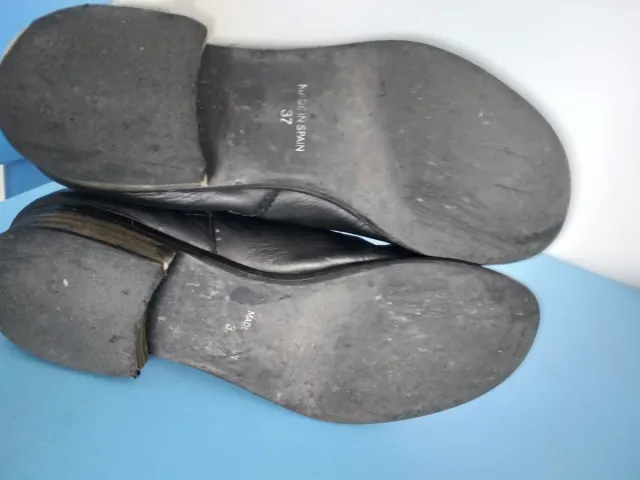 Botas altas de piel negras