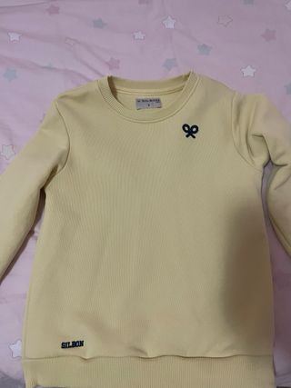 Sudadera amarilla talla 8 con logo