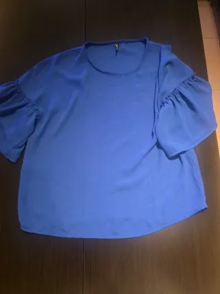 Blusa azul manga abullonada talla S
