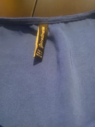 Blusa azul manga abullonada talla S