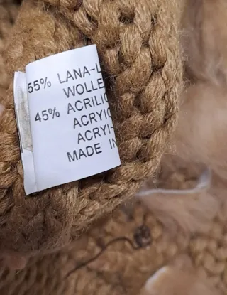 Maglione marrone con pelliccia