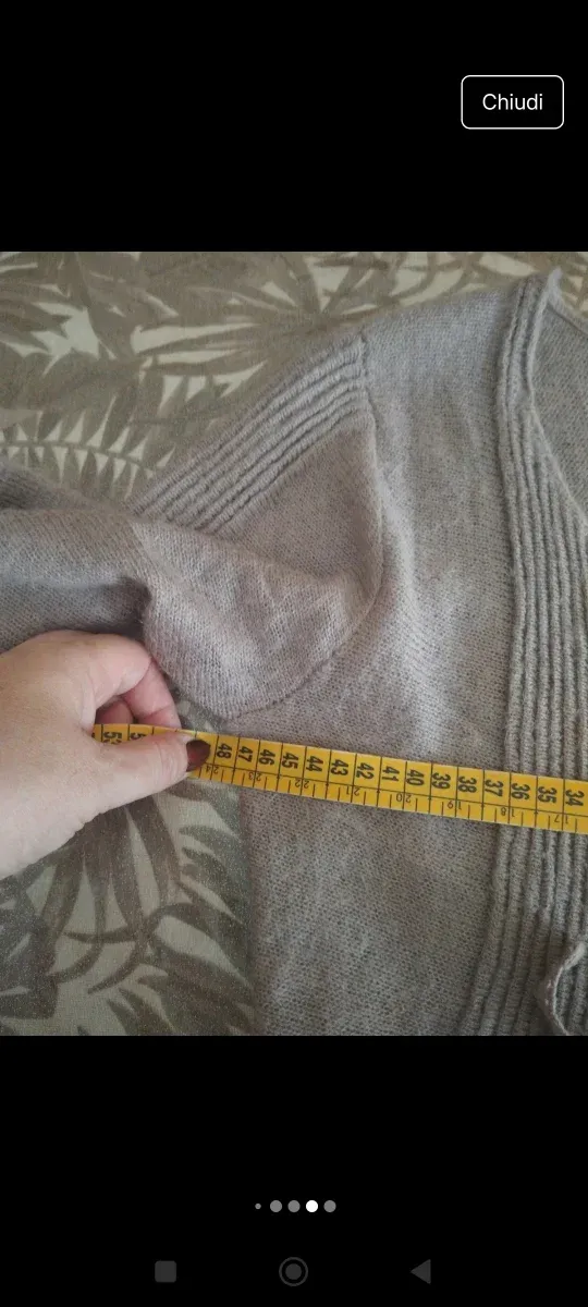 Cardigan rosa con lazada