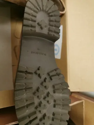 Botas negras con cordones y plataforma Brownie.