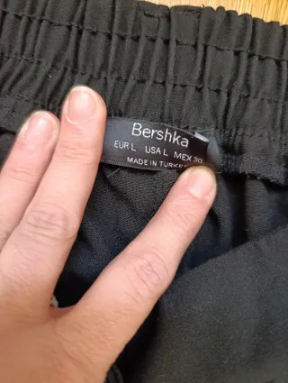 Pantalón tiro alto tobillero con pinzas