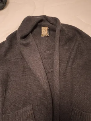 Cárdigan sin mangas asimétrica