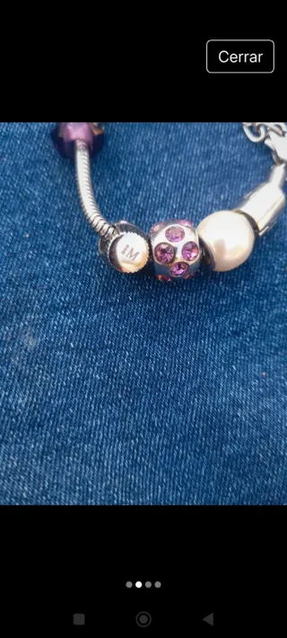 Pulsera plateada con charms