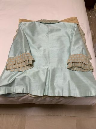 Traje chaqueta y falda lunares