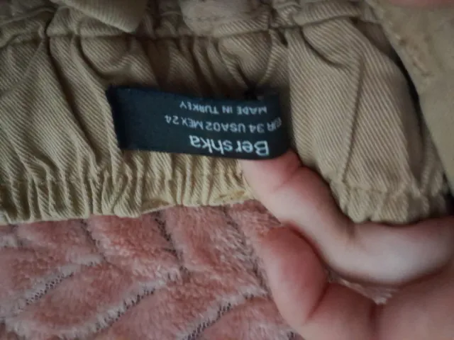 2 pantalones beige y azul