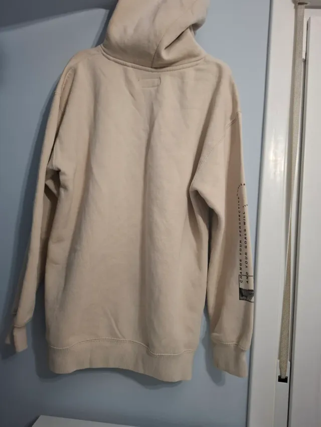 Sudadera beige con estampado ONE