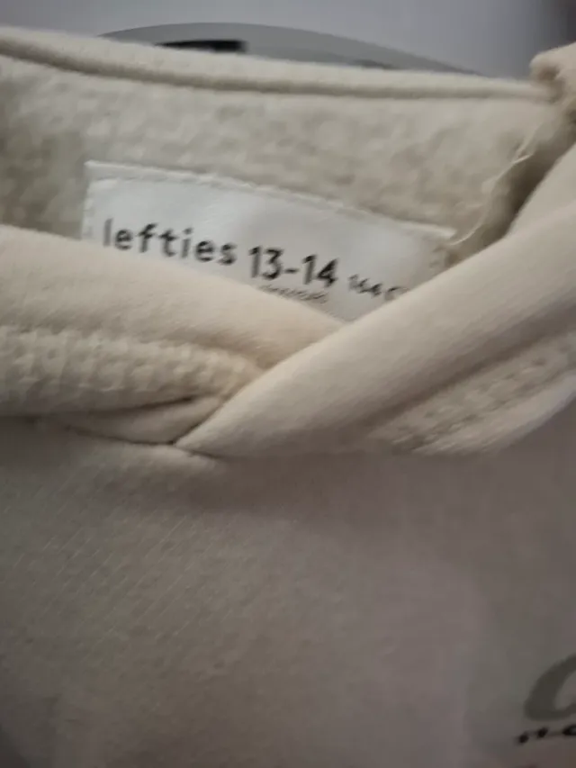 Sudadera beige con estampado ONE