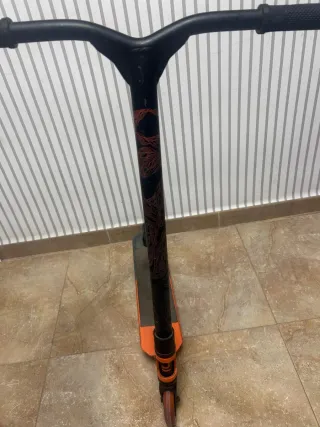 Patinete Freestyle Naranja y Negro