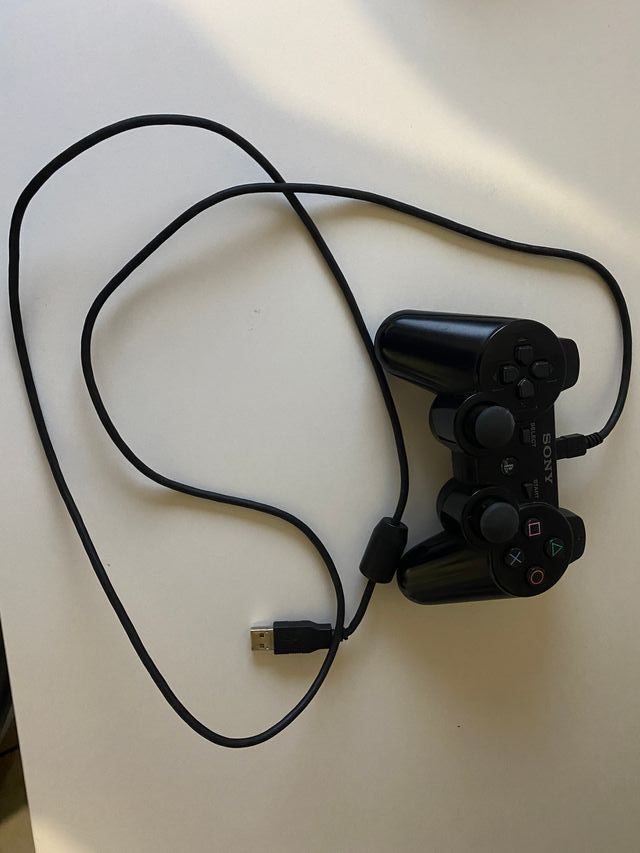 PlayStation 3 Slim + 2 mandos + FIFA 10