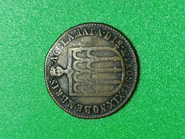 Llavero y monedas plata y bronce