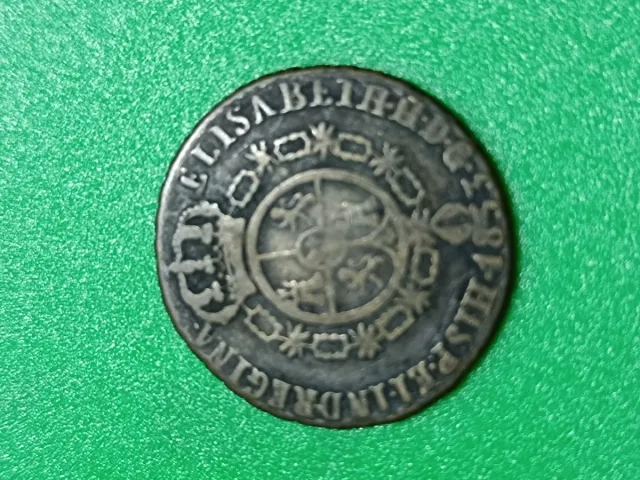 Llavero y monedas plata y bronce