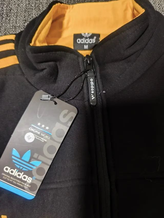 Chaleco Adidas Negro y Amarillo