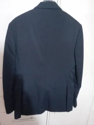 Traje azul de chico con chaleco .