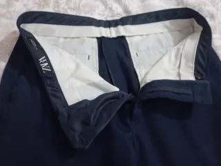 Traje azul de chico con chaleco .