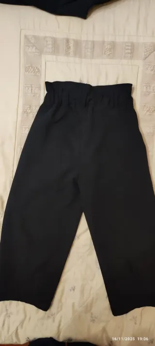 Pantaloni larghi neri con tasche a gamba dritta