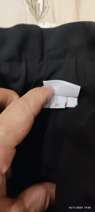 Pantaloni larghi neri con tasche a gamba dritta