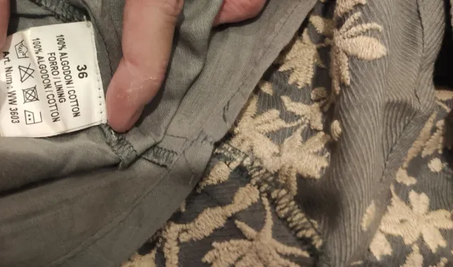 Conjunto azul grisáceo de chaqueta, falda y camise