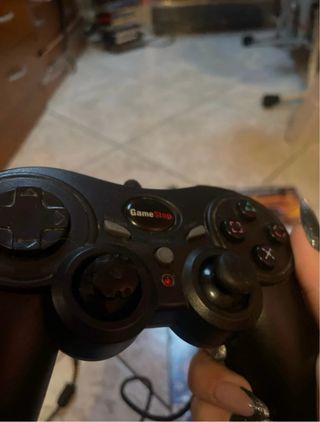 PlayStation 2 Grigia con giochi e controller