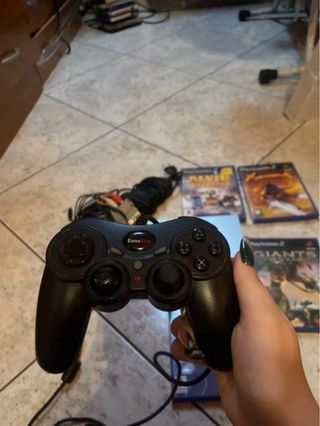 PlayStation 2 Grigia con giochi e controller