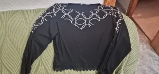 Blusa negra con encaje