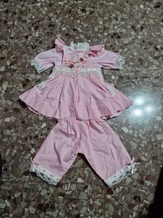 Vestito bambola rosa con pizzo