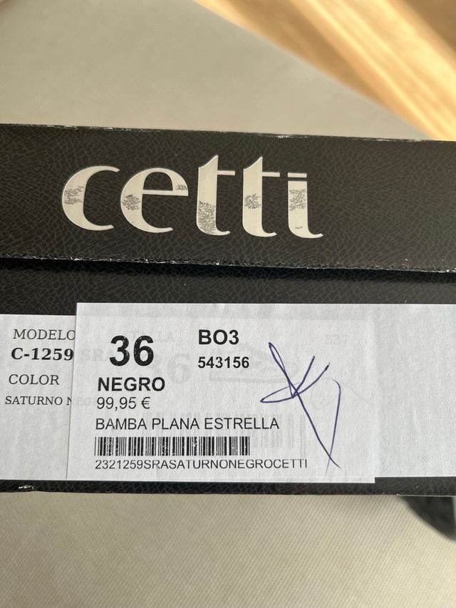 Bambas negras con estrella plateada