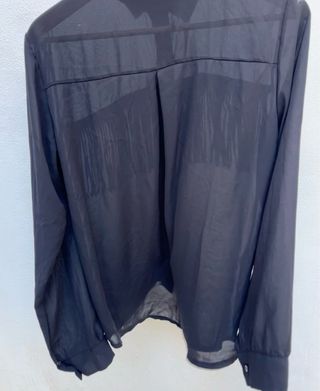 Camisa negra con flecos y pedrería