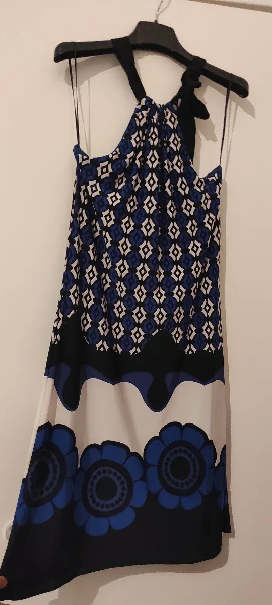 Abito Oltre fantasia geometrica e floreale