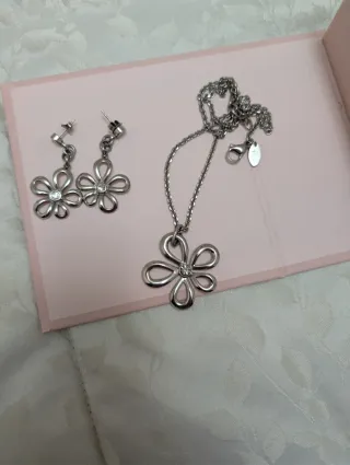 Colgante y pendientes Lotus. Acero