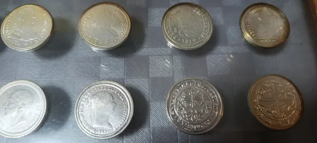 Colección de monedas enmarcada