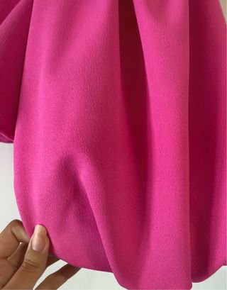 Top rosa mangas abullonadas