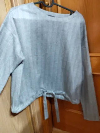 Blusa gris espiga con lazada